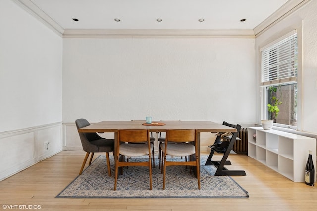 622 W Waveland Ave Unit 2W, Chicago, IL 60613 - dining space featuring ornamental molding, light wood-type flooring, and wainscoting