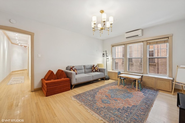 622 W Waveland Ave Unit 2W, Chicago, IL 60613 - living room with a wall unit AC, a chandelier, and light wood-style floors