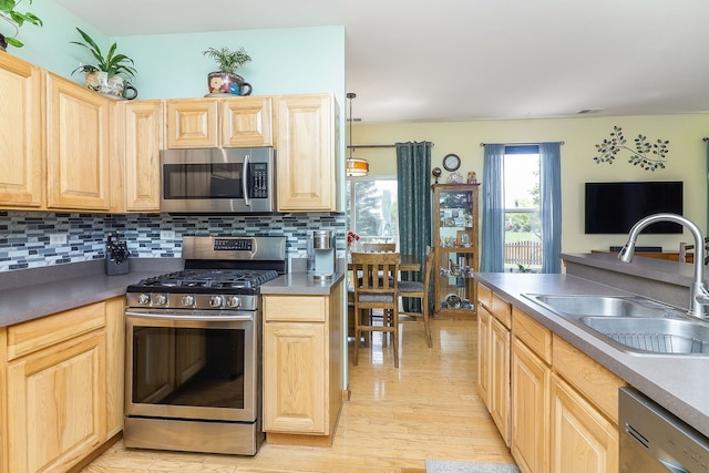 3707 Bowie Ct, Joliet, IL 60435 - kitchen featuring stainless steel appliances, light brown cabinets, and backsplash