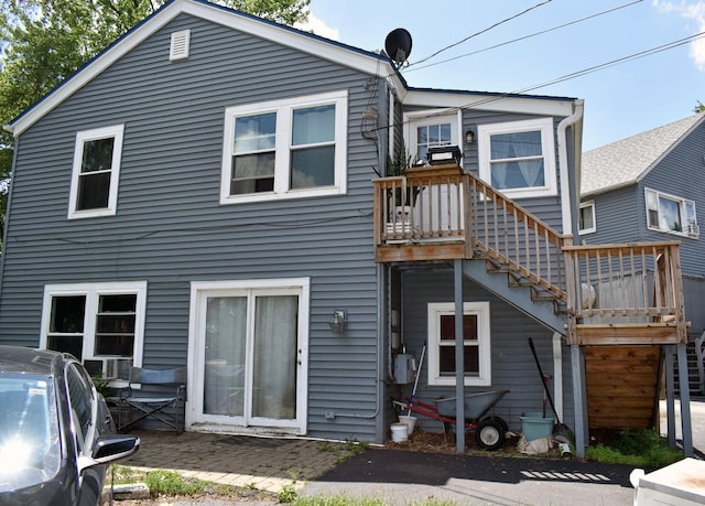 516 Clifton Dr, Round Lake Park, IL 60073 - rear view of house with stairway
