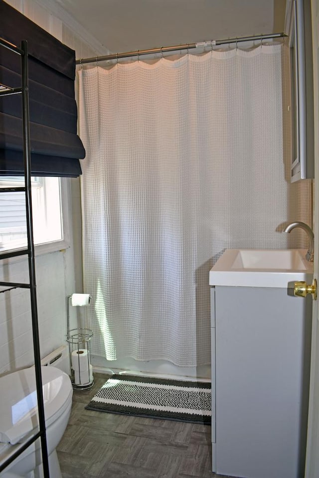 516 Clifton Dr, Round Lake Park, IL 60073 - bathroom featuring vanity, curtained shower, and crown molding