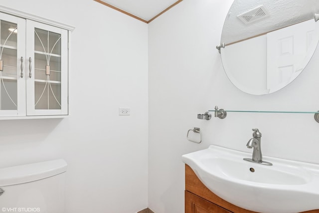 5916 Meadow Dr Unit 149-A, Lisle, IL 60532 - half bath featuring toilet and vanity