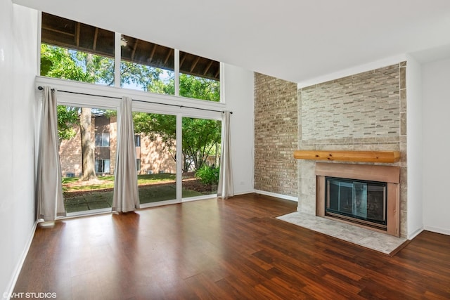 5916 Meadow Dr Unit 149-A, Lisle, IL 60532 - unfurnished living room with a fireplace, wood finished floors, and healthy amount of natural light