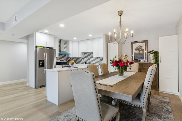 1470 Jefferson St Unit 602, Des Plaines, IL 60016 - dining space with light wood finished floors, a chandelier, and recessed lighting