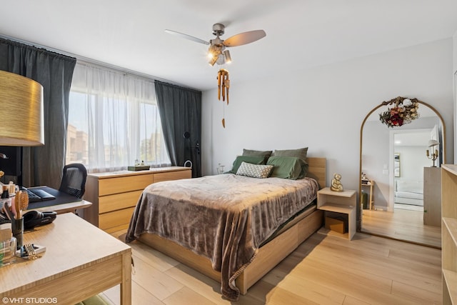 1470 Jefferson St Unit 602, Des Plaines, IL 60016 - bedroom with a desk, light wood finished floors, and ceiling fan