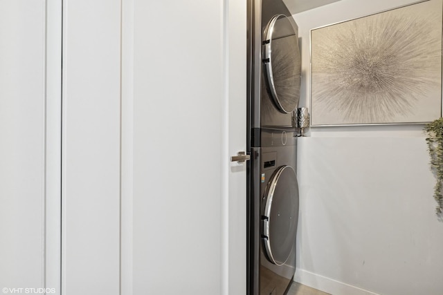 1470 Jefferson St Unit 602, Des Plaines, IL 60016 - laundry area featuring stacked washer and clothes dryer