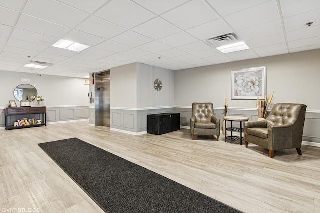 1470 Jefferson St Unit 602, Des Plaines, IL 60016 - lobby with a drop ceiling and a wainscoted wall