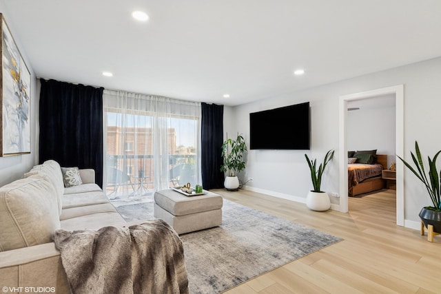 1470 Jefferson St Unit 602, Des Plaines, IL 60016 - living area featuring wood finished floors and recessed lighting