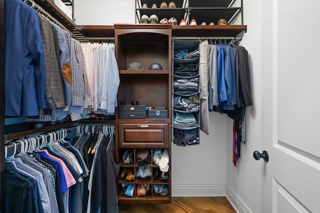 2115 Washington Ave, Wilmette, IL 60091 - walk in closet with wood finished floors