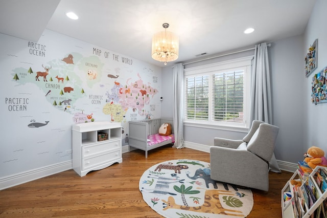 2115 Washington Ave, Wilmette, IL 60091 - game room with a chandelier, wood finished floors, and recessed lighting
