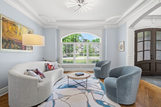 2115 Washington Ave, Wilmette, IL 60091 - living area with french doors, a tray ceiling, decorative columns, arched walkways, and recessed lighting