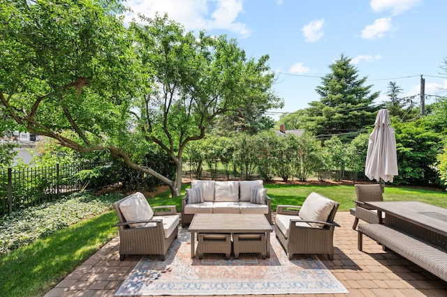 2115 Washington Ave, Wilmette, IL 60091 - fenced backyard with an outdoor living space and a patio
