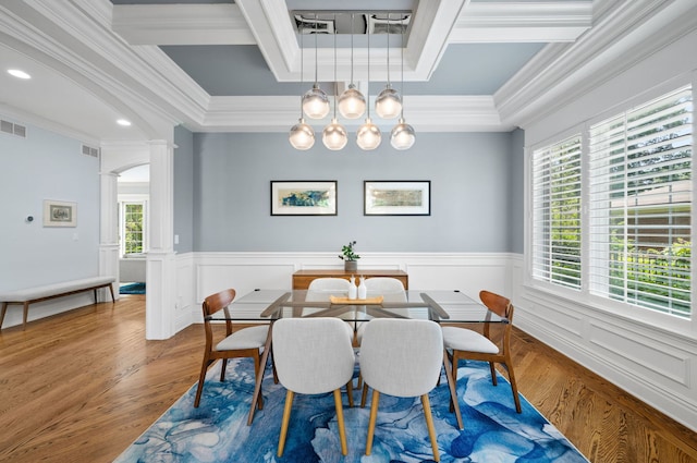 2115 Washington Ave, Wilmette, IL 60091 - dining room featuring ornate columns, wood finished floors, crown molding, a wainscoted wall, and recessed lighting