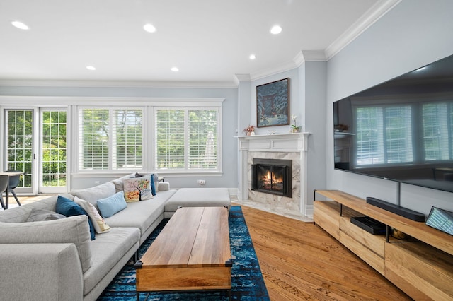 2115 Washington Ave, Wilmette, IL 60091 - living area with wood finished floors, recessed lighting, crown molding, and a premium fireplace