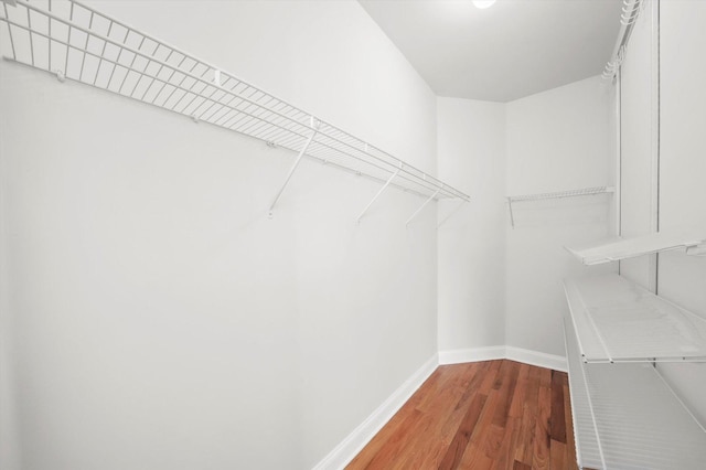 4809 S Wabash Ave Unit 3, Chicago, IL 60615 - walk in closet with wood finished floors