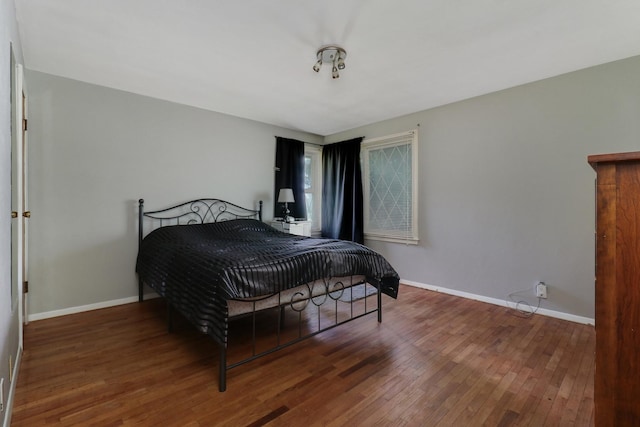 325 W Poplar St S, Heyworth, IL 61745 - bedroom featuring hardwood / wood-style flooring and baseboards