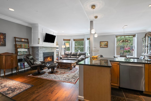 4026 N Clarendon Ave Unit 2N, Chicago, IL 60613 - kitchen with dishwasher, crown molding, a stone fireplace, recessed lighting, and pendant lighting