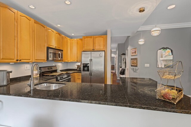 4026 N Clarendon Ave Unit 2N, Chicago, IL 60613 - kitchen with stainless steel appliances, recessed lighting, dark stone countertops, crown molding, and pendant lighting