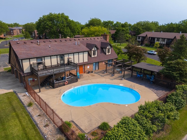 2003 Tracy Dr Unit 1, Bloomington, IL 61704 - community pool with a wooden deck, a fenced backyard, and a patio area