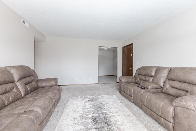 2003 Tracy Dr Unit 1, Bloomington, IL 61704 - carpeted living area featuring baseboards