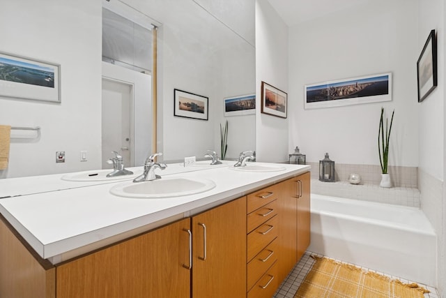 957 W Huron St Unit 2, Chicago, IL 60642 - bathroom with double vanity, a garden tub, and tile patterned flooring