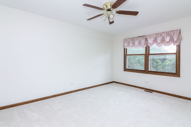 1718 Beloit Dr, Naperville, IL 60565 - carpeted spare room featuring baseboards and a ceiling fan