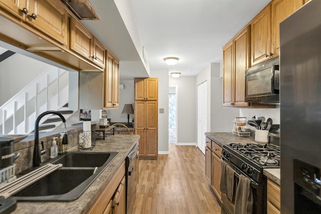 93 Faringdon Dr, Crystal Lake, IL 60014 - kitchen with black appliances, light wood finished floors, and dark countertops