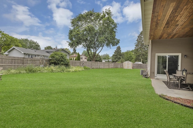 93 Faringdon Dr, Crystal Lake, IL 60014 - fenced backyard featuring a shed and a patio area