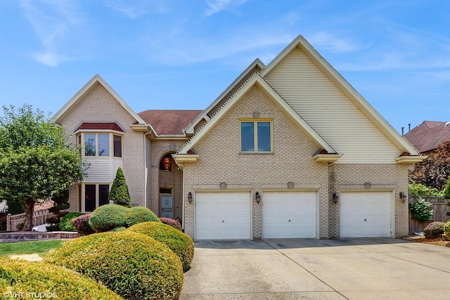 11 Carrington Ct, Hazel Crest, IL 60429 - view of front facade with an attached garage, concrete driveway, and brick siding