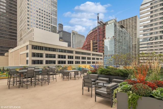 200 N Dearborn St Unit 1803, Chicago, IL 60601 - view of patio / terrace featuring outdoor lounge area, a city view, and outdoor dining space