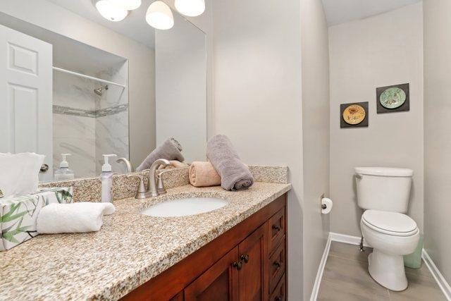 3256 Sanders Rd Unit 4E, Northbrook, IL 60062 - full bath featuring vanity and a shower