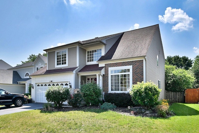 537 Ivory Ln, Bartlett, IL 60103 - view of front of home with brick siding, driveway, and roof with shingles