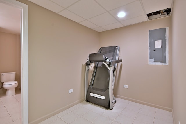 537 Ivory Ln, Bartlett, IL 60103 - workout room featuring electric panel, light tile patterned floors, and a paneled ceiling