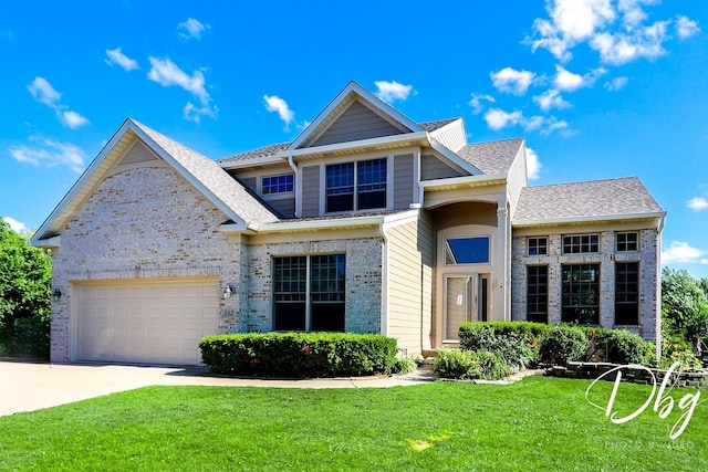 582 Aspen Way, Antioch, IL 60002 - view of front of property with driveway, a front yard, a garage, brick siding, and roof with shingles