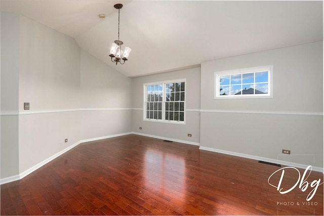 582 Aspen Way, Antioch, IL 60002 - spare room with a chandelier, wood-type flooring, and lofted ceiling