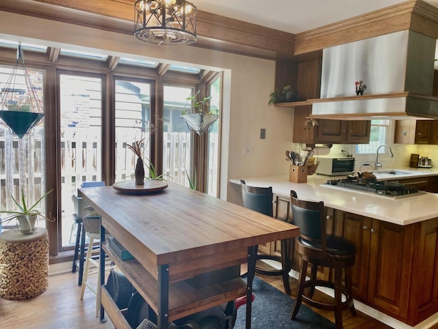 824 62nd St, Downers Grove, IL 60516 - dining space featuring light wood-type flooring, healthy amount of natural light, and a chandelier
