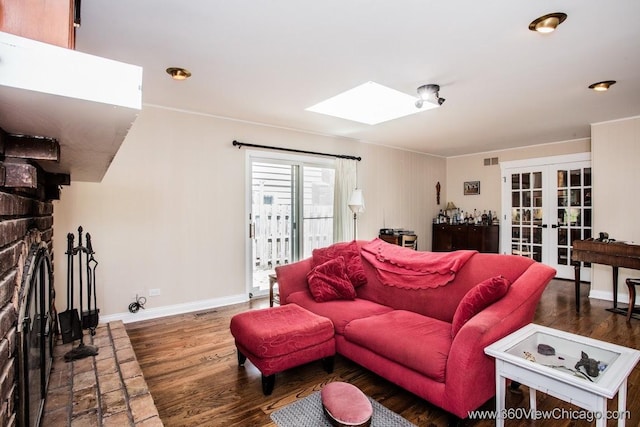 824 62nd St, Downers Grove, IL 60516 - living room with wood finished floors, a skylight, french doors, and recessed lighting