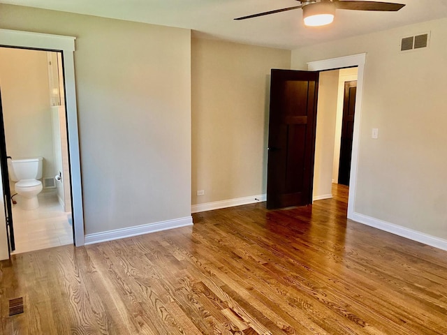 824 62nd St, Downers Grove, IL 60516 - unfurnished bedroom featuring wood finished floors, ensuite bath, and a ceiling fan