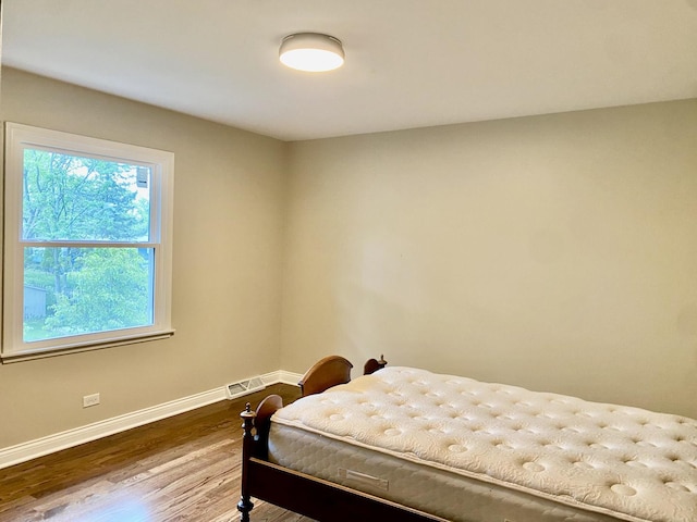 824 62nd St, Downers Grove, IL 60516 - bedroom featuring baseboards and wood finished floors