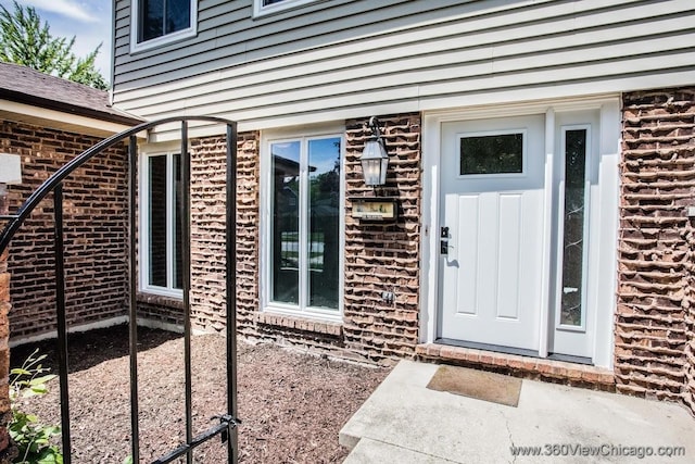 824 62nd St, Downers Grove, IL 60516 - doorway to property featuring brick siding
