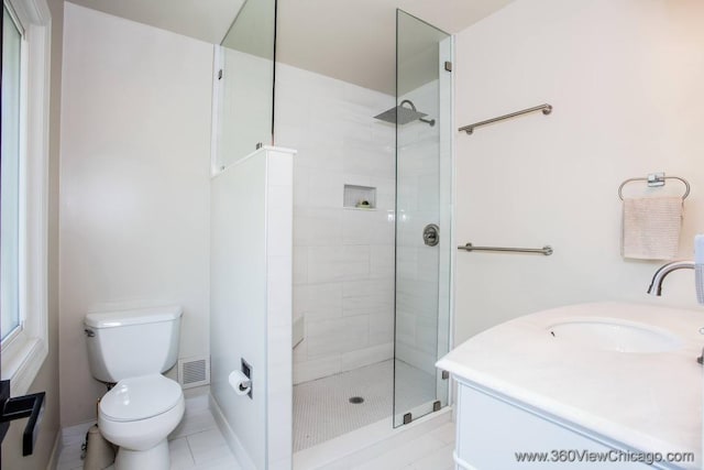 824 62nd St, Downers Grove, IL 60516 - bathroom with tiled shower, vanity, and tile patterned floors
