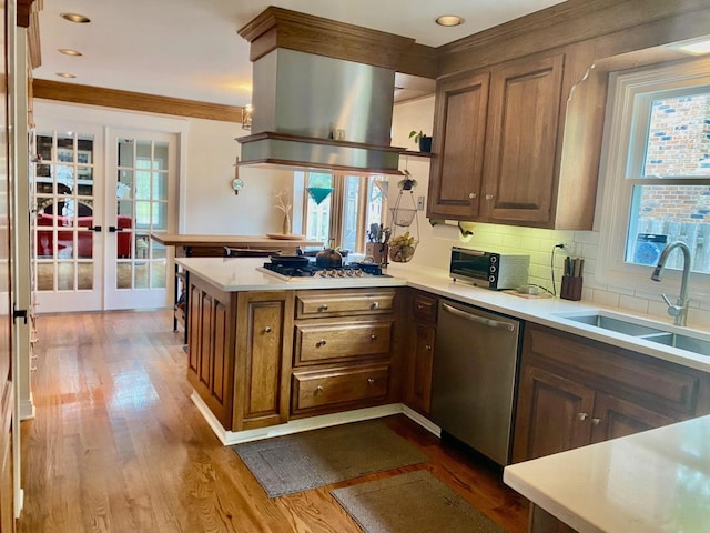 824 62nd St, Downers Grove, IL 60516 - kitchen with stainless steel dishwasher, gas cooktop, a peninsula, french doors, and dark wood-style flooring