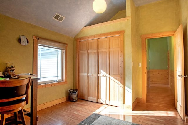 7842 S Blazer Ave, Justice, IL 60458 - bedroom with light wood-style floors and lofted ceiling