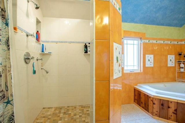 7842 S Blazer Ave, Justice, IL 60458 - full bath with a tile shower, a bath, and tile walls