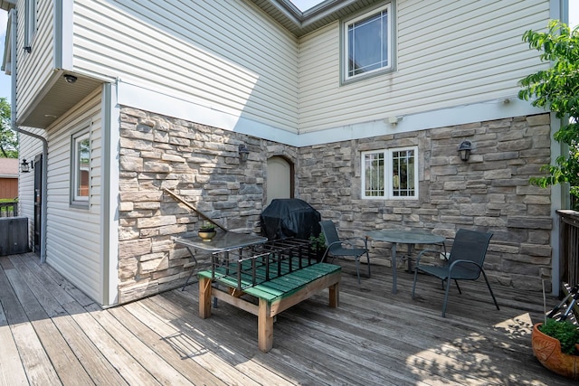 7842 S Blazer Ave, Justice, IL 60458 - wooden terrace with outdoor dining space and grilling area
