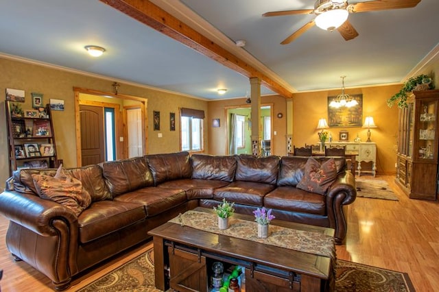 7842 S Blazer Ave, Justice, IL 60458 - living room featuring light wood finished floors, ceiling fan, ornamental molding, and a chandelier