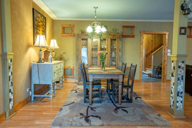 7842 S Blazer Ave, Justice, IL 60458 - dining space with wood finished floors, a chandelier, and ornamental molding