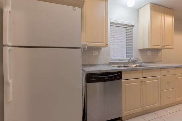 719 W 31st St Unit 2, Chicago, IL 60616 - kitchen with freestanding refrigerator, dishwasher, light brown cabinets, and light tile patterned floors