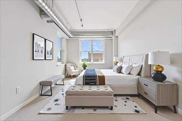 950 W Monroe St Unit 808, Chicago, IL 60607 - bedroom with baseboards and light colored carpet