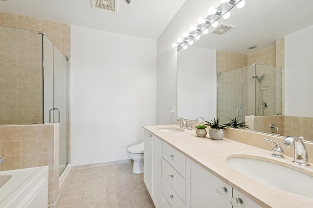 950 W Monroe St Unit 808, Chicago, IL 60607 - bathroom with double vanity, a shower stall, a garden tub, and tile patterned flooring